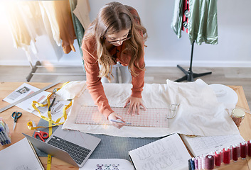 Image showing Fashion, designer and fabric woman with sewing tools, measuring tape and laptop for manufacturing, production and retail process. Creative, startup and textile industry worker with clothes pattern