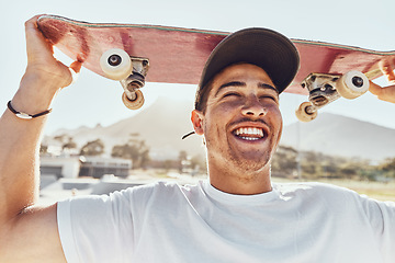 Image showing Skateboard, man and smile for happiness, outdoor and confident for holiday, relax and happy. Skater, young male and wellness enjoy casual day, being edgy and trendy with break, cool and on weekend.