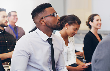 Image showing Presentation, conference or black man in seminar learning, research or business meeting with colleagues. Businessman, training or employee and team for marketing, advertising or innovation strategy