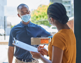 Image showing Covid, delivery and man with a box for a black woman in face mask for coronavirus compliance after online shopping. Ecommerce, thank you and African girl customer signing paper on a clipboard at door