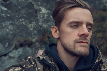 Image showing Caucasian man in the mountain making selfie