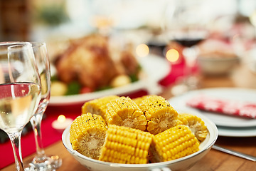 Image showing Corn, healthy and lunch on a table for a celebration, Christmas and nutrition in a house. Food, holiday and dinner in the dining room to celebrate Thanksgiving with a feast and vegetables at home