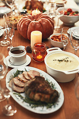 Image showing Christmas, tradition and lunch celebration with food on a dining room table during a holiday. Nutrition, healthy and dining table during Thanksgiving for a dinner party, roast dinner or supper