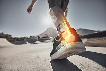 Image showing Muscle pain, injury and leg of a skater at a park for exercise, sports and urban cardio. Fitness, training and x ray lighting of the bone and anatomy in the foot of a person skating in the city