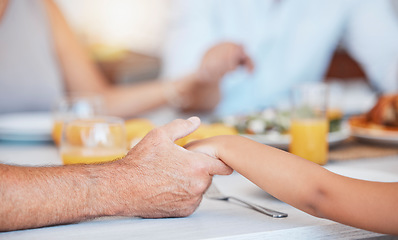 Image showing Family, hands and gratitude prayer for food at table together for faith, religion and appreciation. Christian, child and senior man holding hands to give thanks and pray to God for lunch.