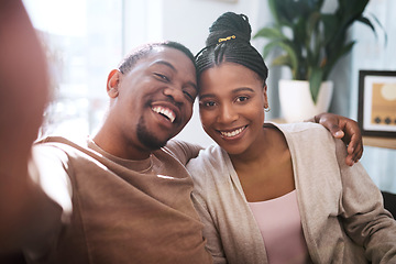 Image showing Portrait, black couple and selfie in living room, happy and relax while bonding, embrace and smile in their home. Face, love and man with woman in lounge for photo, enjoy their relationship