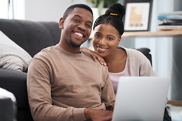 Image showing Portrait, couple and laptop on a living room floor for movie, date and entertainment in their home together. Face, black couple and online streaming by happy, relax and content people bonding
