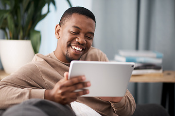 Image showing Tablet, happy or black man on social media to relax or enjoy comedy movies or funny meme online at home. Subscription, ui or laughing African user watching or streaming comic digital content on sofa