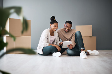Image showing Real estate, property and black couple with boxes and tablet for furniture shopping or search renovating ideas. Happy owners, relocation and tenants on digital touchscreen on moving day in new home.