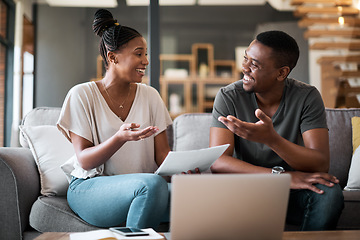 Image showing Black couple, tax paperwork and bills together on sofa of living room at home with laptop, financial documents and planning savings. Family finances, organizing budget and paying debt online with pc