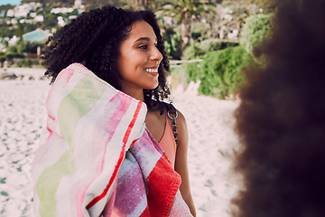 Image showing Beach, friends and black woman with towel in summer enjoying holiday, vacation and weekend by seaside. Travel, nature and happy girl ready for sun tan, swimming and relax on adventure by the ocean