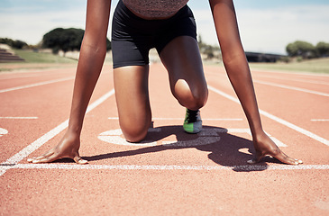 Image showing Start running and sports with black woman on stadium ground for training, stamina and workout. Strong, energy and stamina with runner and ready for race track, competition and cardio development