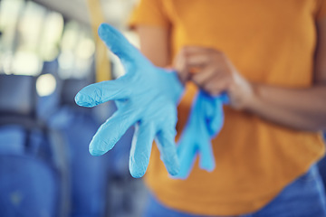 Image showing Hand glove, covid safety and protection with cover for prevention and protection from covid 19, bacteria and disease in a pandemic. Health, wellness and public transport in a bus and travel in city