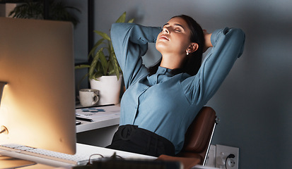 Image showing Burnout, tired or business woman sleeping on the desk in office at night taking break. Fatigue, startup employee relax with stress or mental health taking nap at workplace while working on project