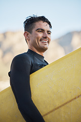 Image showing Happy surfer, man carrying surfboard and board for surfing sport on ocean waves for fitness workout, summer wellness surf and water training exercise. Beach freedom, sea wetsuit and surf in Australia
