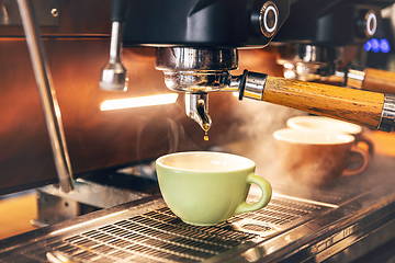 Image showing Coffee machine preparing fresh coffee