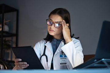 Image showing Woman, healthcare doctor and stress or headache on tablet for research in medical hospital. Young girl, pharmacist and burnout or health fatigue problem at night with mental health and digital device