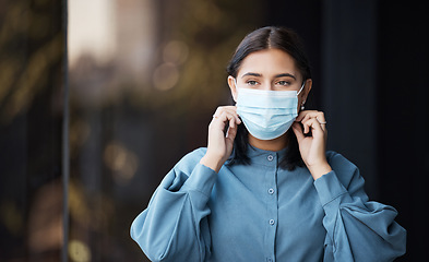 Image showing Face mask, woman and covid business worker in an office with health and corona virus safety. Company employee doing covid 19 healthy security policy in the workplace ready for office working
