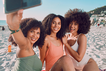 Image showing Summer, beach and friends taking a selfie with phone enjoy holiday, vacation and weekend getaway. Travel, happiness and group of black women smile for picture on adventure, freedom and fun by ocean