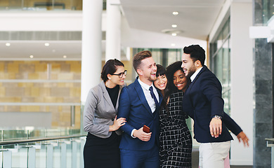 Image showing Hug, support and business people excited about success, partnership and giving motivation. Smile, collaboration and corporate friends hugging after an achievement, win or promotion at an agency