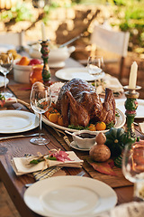 Image showing Thanksgiving, food and turkey table for gratitude, thanks and grace holiday lunch outside. Roast, vacation and festive outdoor dining meal with colorful decoration for USA celebration.