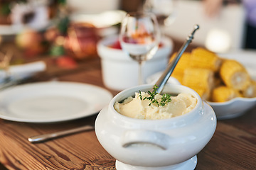 Image showing Mash potato, food and lunch for Christmas on a dining room table for celebration, nutrition and health. Healthy eating, dinner and lunch for Thanksgiving feast, dinner party or fine dining in a house
