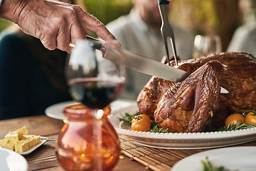 Image showing Hands, food and man with turkey on thanksgiving, lunch and meal at table with hungry people celebrate tradition. Family, chicken and hand prepare meat for social gathering, holiday and family reunion