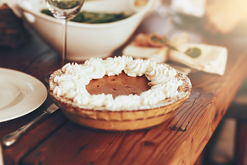 Image showing Pumpkin pie, food and table set for lunch on dinning table in home. Fine dining, cake or pastry for buffet, brunch or thanksgiving party, festive celebration or luxury dessert, meal or dish in house