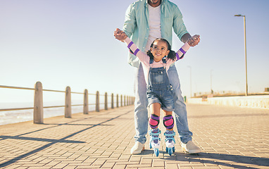 Image showing Girl, dad and park for skating, learning and hands to hold for balance, care and safety on concrete. Father, child and roller skates with teaching in urban, ocean promenade or walk in summer sunshine
