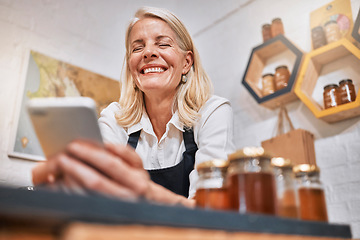 Image showing Phone, sales and success with woman in store for honey, supermarket and natural grocery. Organic, health and wellness with small business owner and profit for retail, nutrition and vitamin products