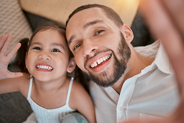 Image showing Happy, child and father take a selfie for a social media memory with a smile on their faces relaxing at home on a sofa. Happiness, papa and fun young girl toddler love taking pictures as a family