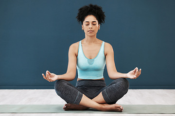 Image showing Meditation, yoga and zen of a black woman in a wellness and health studio for mindfulness. Workout, praying and holistic exercise of an athlete for pilates relax with peace mindset and chakra