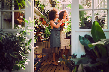 Image showing Tablet, plants and women, florist shop and nature in retail store, service and eco friendly market. Female seller staff check flowers, leaves and digital planning for sustainable startup management