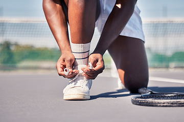 Image showing Sports, tennis and man tie shoes before game start, competition or fitness exercise on outdoor tennis court. Wellness health, ground and legs of African player prepare for workout, training or cardio