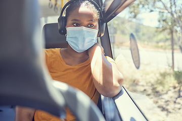 Image showing Black woman, covid or headphones in bus, public transport or commute in healthcare, bacteria virus or wellness compliance. Thinking, travel passenger or student face mask and listening to radio music