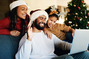 Image showing Christmas, video call and laptop with family in living room for communication, connectivity and celebration. Internet, technology and online with parents and child wave for holiday, festive and xmas