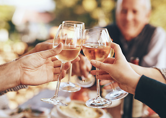 Image showing Hands, glass and cheers with a group of people drinking alcohol together outdoor in celebration of the festive season. Party, wine and drink with a man and woman family doing cheers to tradition