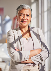 Image showing Fashion design, business and portrait of senior woman with crossed arms standing in design studio. Leadership, success and mature black woman with startup in fashion, cosmetics and clothing industry