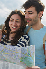 Image showing Travel, map and vacation with a couple searching for directions while overseas or abroad on honeymoon. Love, navigation and sightseeing with a man and woman on the search for a tourist attraction