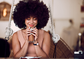 Image showing Black woman, coffee and relax at cafe with smell of drink or tea for self care, mental health or calm break. Happy african woman, latte or iced coffee with smile, peace or happiness in coffee shop