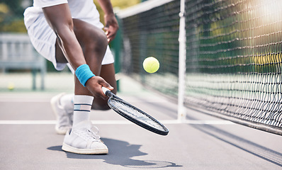 Image showing Tennis, fitness and black man hands in an outdoor sports court game doing training and workout. Wellness exercise and cardio energy of an athlete on a tennis court in a professional competition