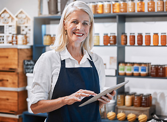 Image showing Success, tablet and woman manager of a small business, honey store or retail shop searching online. Smile, portrait and happy entrepreneur scrolling the internet for digital marketing advice or tips