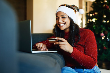 Image showing Online shopping, Christmas and woman with credit card and laptop for banking on the internet from home. Finance, ecommerce and girl shopping for xmas celebration with debit card on the web with a pc