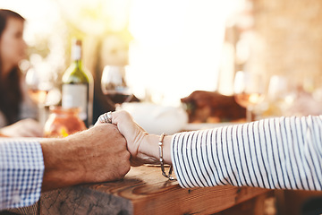 Image showing Family hands and praying at lunch for worship at table for thanksgiving, family lunch or gathering in a home. Food, pray and hand of people praying before sharing a meal together, respect and grace