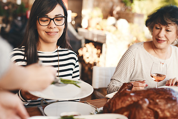 Image showing Food, wine and celebrate with dinner, party with women and meal for holiday celebration outdoor. Christmas or thanksgiving feast with family, social and nutrition with tradition and serve vegetables