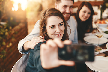 Image showing Selfie, happy and friends at dinner party, lunch celebration and reunion at restaurant. Smile, people and taking photos on smartphone at social gathering with food, eating and young group together