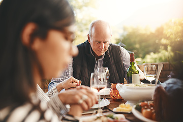 Image showing Family party, celebration and praying before a lunch, Christmas and gathering with food in a backyard. Holding hands, gratitude and friends with a prayer for Thanksgiving dinner on a patio garden