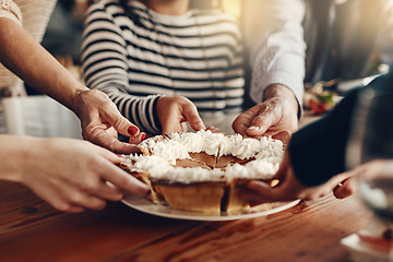 Image showing People, hands and pumpkin pie at a party for a thanksgiving celebration, event or gathering at home. Traditional dessert, cake or pie at a holiday dinner, lunch or meal in the dining room at a house.