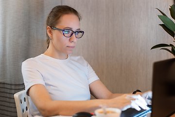 Image showing Woman in quarantine for coronavirus working from home