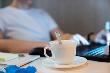 Image showing Woman in quarantine for coronavirus working from home